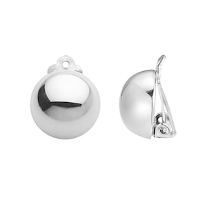 May include: A pair of silver clip-on earrings with a round, smooth ball design.