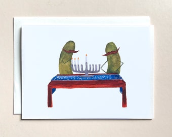 Des cornichons fantaisistes allumant la carte de Hanoucca vierge Menorah