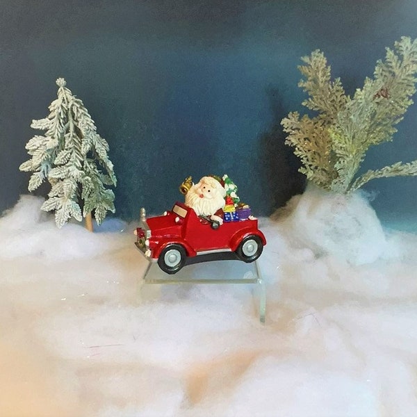 Santa's Red Car With Christms Tree and Presents