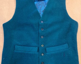 Size small for 37" chest only - rustic style waistcoat in heavy wool, blue-green shade with 2 working pockets, cotton lining