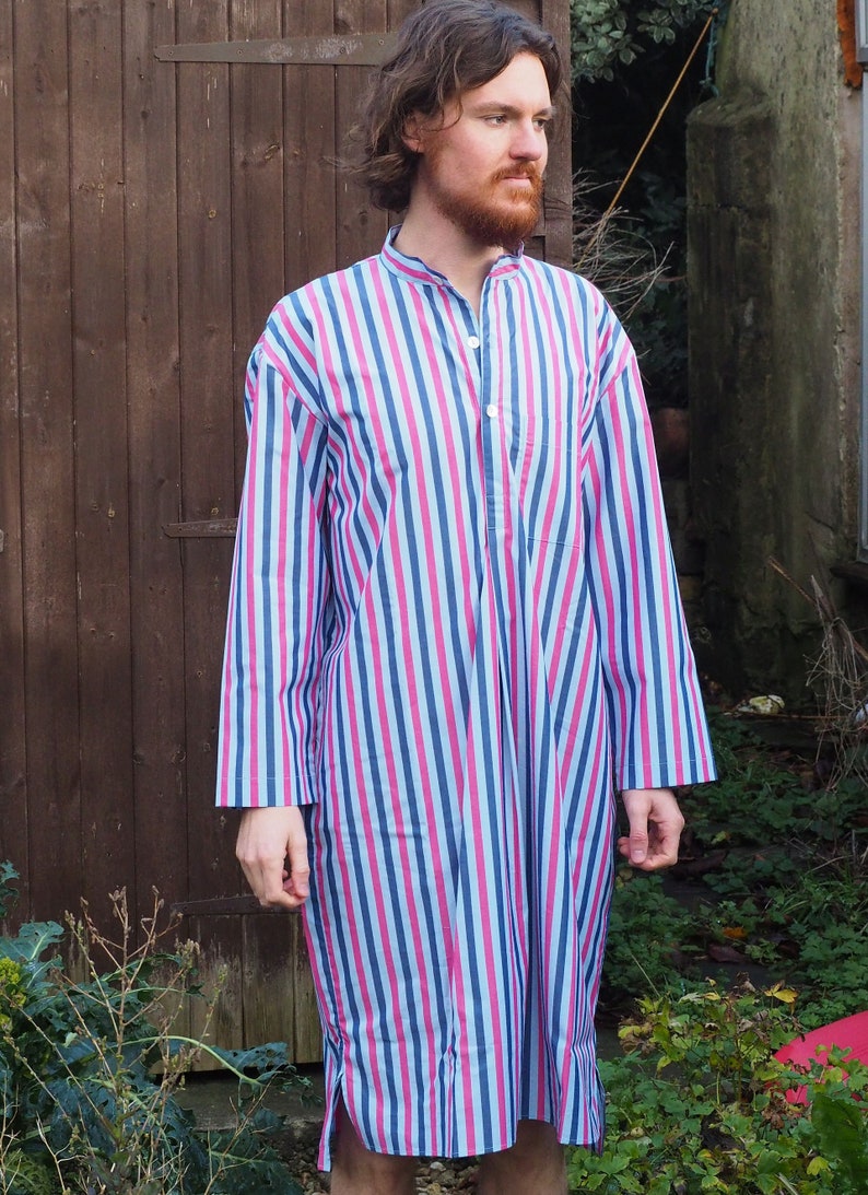 1920s Men’s Pajamas, Smoking Jacket, Slippers History Smooth cotton nightshirt in bright stripe all sizes $85.29 AT vintagedancer.com