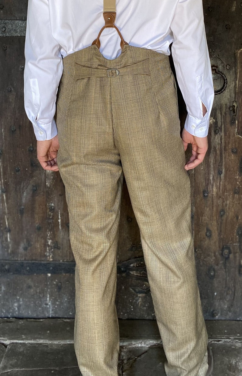 Men’s Steampunk Pants & Trousers     Mens high waist trousers in brown wool check with button fly and brace buttons  AT vintagedancer.com