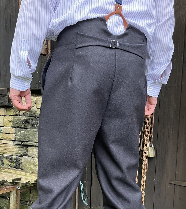 Victorian Men’s Pants – Victorian Steampunk Men’s Clothing     High waist dark navy trousers in military weight wool button fly and brace buttons  AT vintagedancer.com