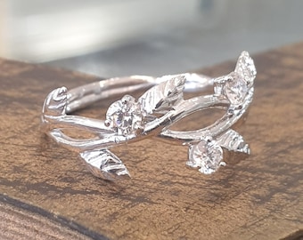 Diamantbladsring: Förlovningsring i 14 karat vitt guld