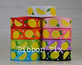 May include: Assortment of colorful lemon-printed ribbon rolls. Each roll features a different color background with white polka dots and yellow lemons. The text "Ribbon Fix" is visible in the center of the image.