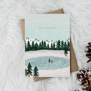 Carte de Noël du lac de patinage sur glace