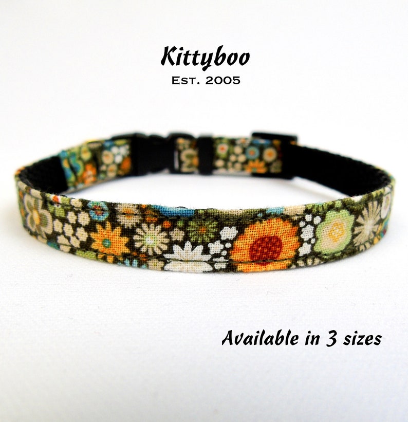 May include: A green, black and orange floral patterned dog collar with a black plastic buckle. Kittyboo Est. 2005. Available in 3 sizes.