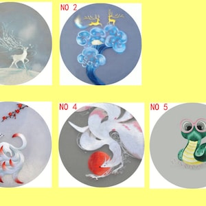 May include: Five round embroidery designs featuring different animals. The first design shows a white deer with antlers in a snowy landscape. The second design shows a blue and white cloud with a golden deer. The third design shows a white fox with nine tails. The fourth design shows a white fox with nine tails and a red orb. The fifth design shows a green snake with pink glasses.