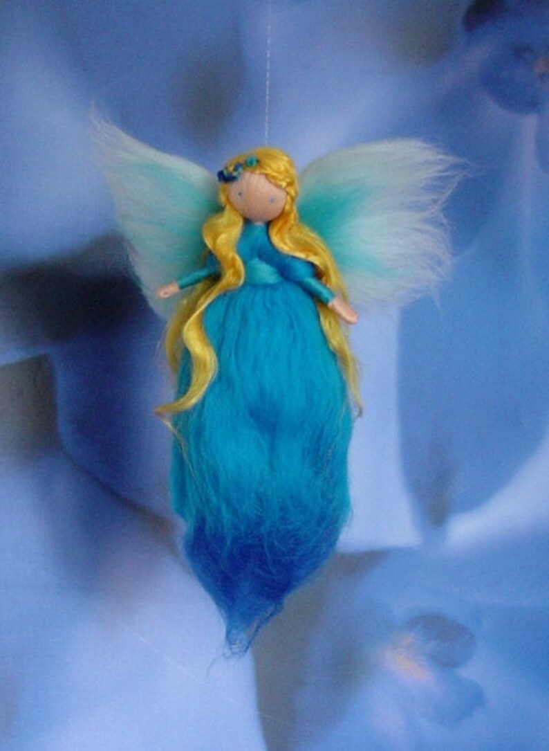 Turquoise and gold fairy image 2