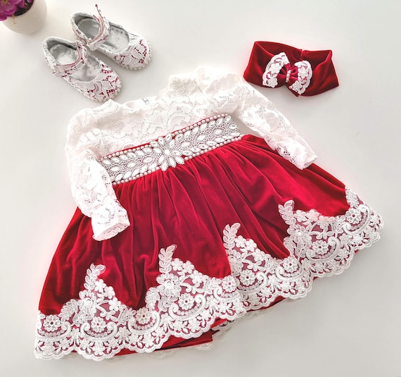 holiday dress newborn Petit Ami,preemie Christmas dress,preemie smocked Christmas outfit,newborn Christmas dress,newborn Christmas outfit,smocked baby dress,smocked Christmas dress,baby Christmas dress,baby dress,baby smocked Christmas dress,infant smocked christmas and will have everyone believing this is a handmade family dress passed down specially for your little one holiday dresses for baby girl