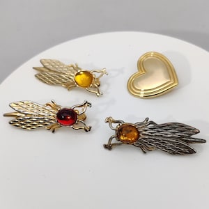 signed YVES ROCHER vintage metal brooch