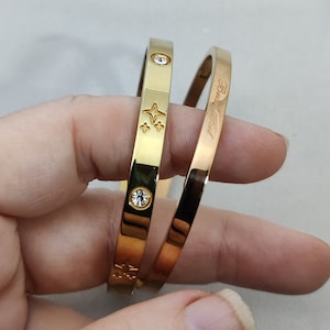vintage gearticuleerde armband van goud metaal