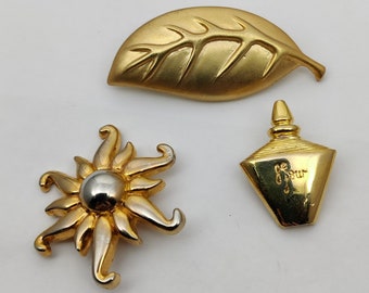 Yves Rocher signed vintage metal brooch