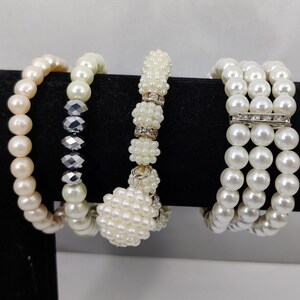 vintage this elasticated cuff bracelet in pearly white beads
