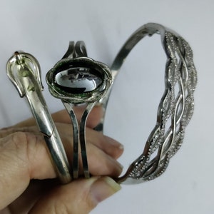 vintage articulated bangle bracelet in silver metal