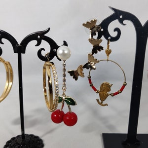 Pairs of vintage gold-tone metal earrings for pierced ears