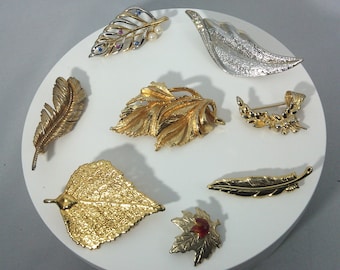 Vintage leaf shaped brooches