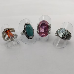 vintage ring in silver metal and decorated with zirconium oxide cabochons and rhinestones