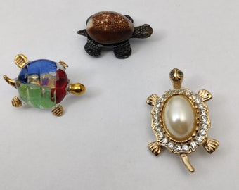 Vintage metal brooches representing turtles, zoomorphic brooch