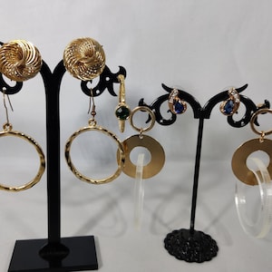 Pairs of vintage gold-tone metal earrings for pierced ears