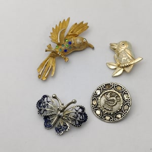 old vintage zoomorphic brooch in metal, rhinestones and enamel