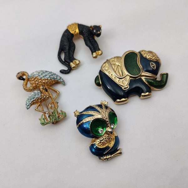 Vintage gold metal brooches representing various animals, zoomorphic brooch