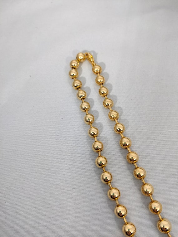 Gucci Collier Chaîne En Métal Doré Avec Pendentif GG En Cristal Multicolore  476890