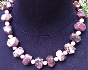 necklace made of genuine natural semi-precious stones in pink color