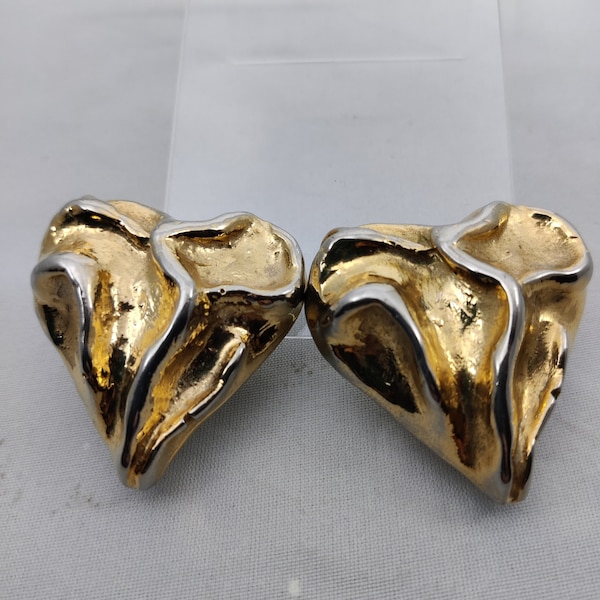 signed JACKY DE G Made In France these vintage clip earrings in gold metal