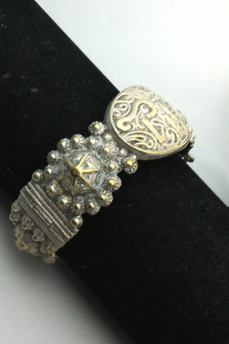 oriental bracelet articulated in vintage silver metal