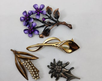 豪華に装飾された花や植物を描いたヴィンテージのブローチ - Etsy 日本