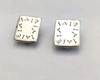 signed CYCLOPE vintage clip-on earrings in silver metal