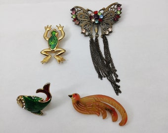 Vintage metal brooches representing various animals, zoomorphic brooch