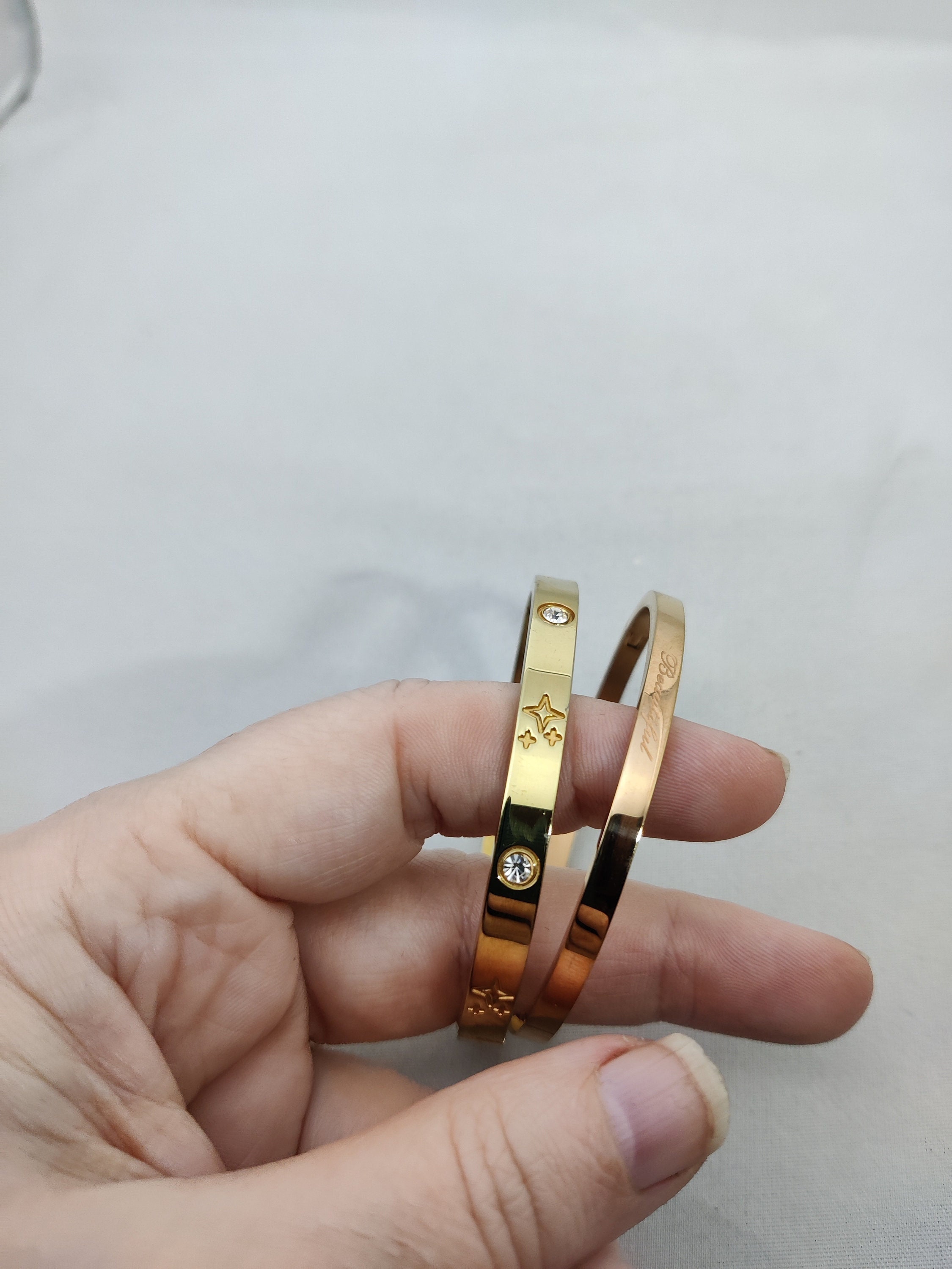 vintage articulated bangle bracelet in gold metal
