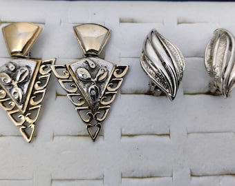 vintage clip earrings in gold metal and silver metal