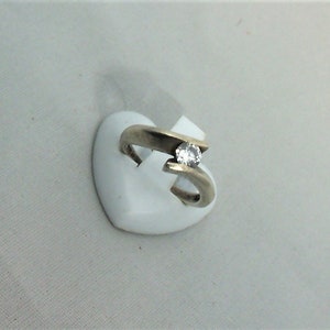vintage ring with 1 round zircon on a solid silver setting