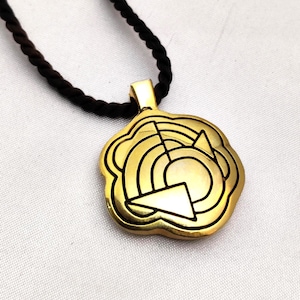 signé CARON PARIS  collier sautoir vintage avec cordon et pendentif diffuseur de parfum doré