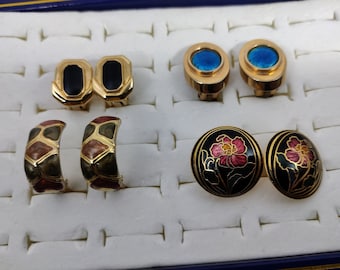 vintage clip-on earrings in gold metal and enamel