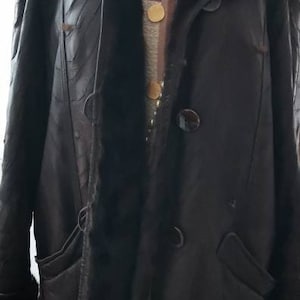 Lovely leather & mink lined coat . Size Medium to  Large. Chic.