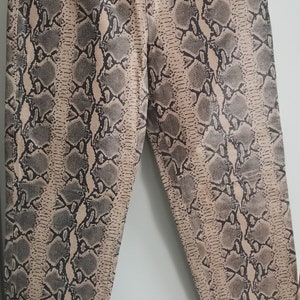 Fab python print leather pants with slits. US6. NWT. Chic.