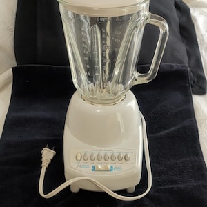 May include: A set of three ceramic mugs with a speckled, matte finish. The mugs are in shades of cream, light gray, and dark gray. Each mug has a simple, minimalist design, perfect for coffee or tea.