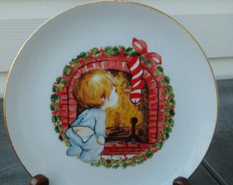 Vintage 1982 JASCO Christmas Plate, White Porcelain, Gold Trim, Boy in Pajamas Looking for Santa in Fireplace.