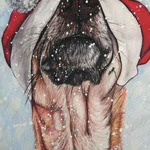 May include: A close-up painting of a dog wearing a red and white Santa hat, with a fluffy white pom-pom. The dog's fur is brown and black, and white snowflakes are falling around it. The dog's nose is dark brown.