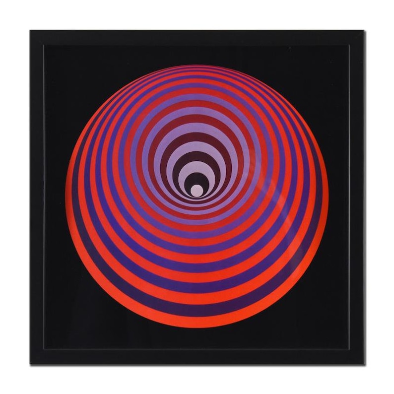 May include: A framed print of an abstract optical illusion with concentric circles in shades of red, purple, and black.