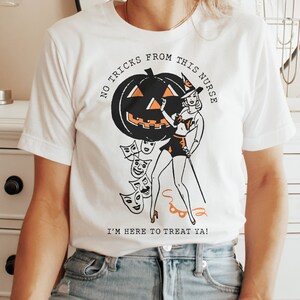 ハロウィンナースシャツ、ナースハロウィンTシャツ、ナースへのハロウィンギフト、不気味なナースシャツ、秋のナースシャツ、面白いナースシャツ
