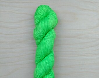 May include: A skein of bright green yarn.
