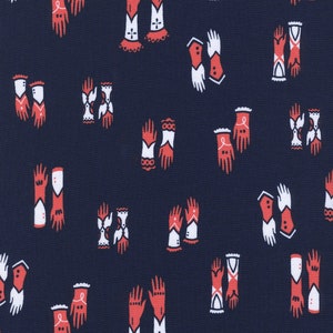 May include: Dark blue fabric with a repeating pattern of stylized red and white gloves. The gloves have various designs, including lace cuffs and decorative elements. The overall design is a vintage or retro style.