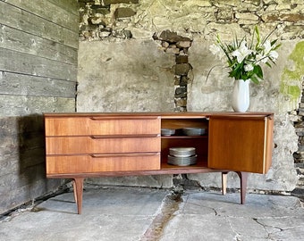Stunning Refurbished Mid Century Teak Sideboard or Cadenza with bi-fold cupboard doors and unique waxed particleboard top