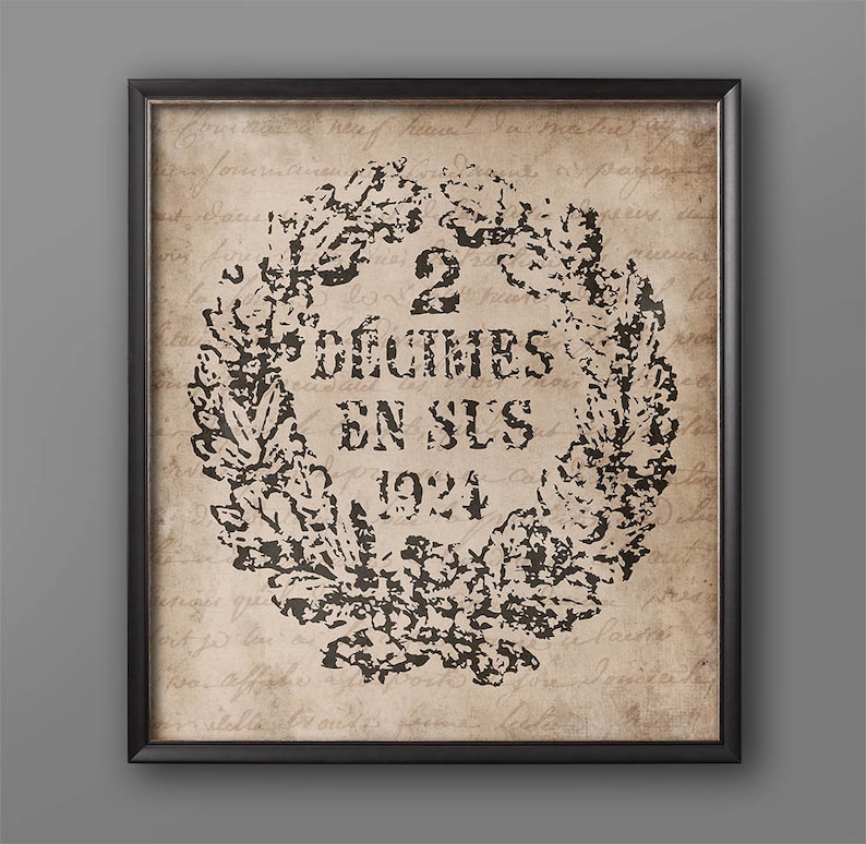 May include: A vintage-style print with a black and white image of a wreath with the text "2 Decimes en Sus 1924" on a beige background.