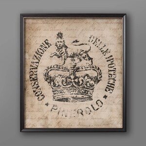 May include: A vintage-style print featuring a black and white illustration of a crown and a lion with the text "CONSTITUTIONAL MONARCHY" and "MADE IN HOLLAND" in a circle around the crown and lion.